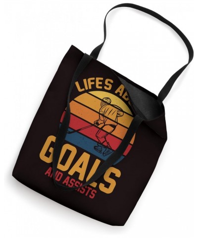 Hockey - Life's About Goals And Assists Tote Bag $14.45 Totes