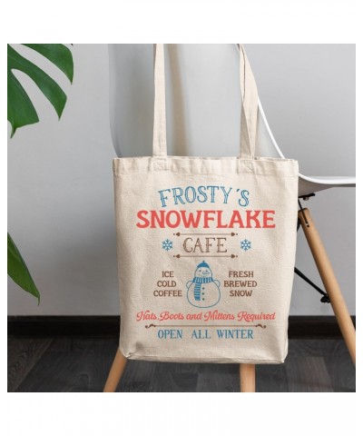 Witty Frosty's Snowflake Cafe with a Snowman, Christmas Shop Sign Art Merch Gift, 12oz Canvas Tote Bag $15.38 Totes